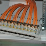 Anschluss der Netzwerkkabel ans Patchpanel Anschluss der Netzwerkkabel ans Patchpanel